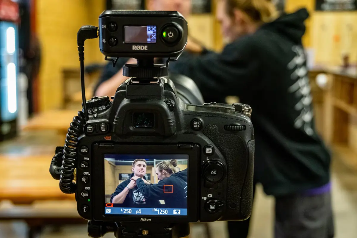 A content creator planning a video content strategy with camera equipment and storyboard